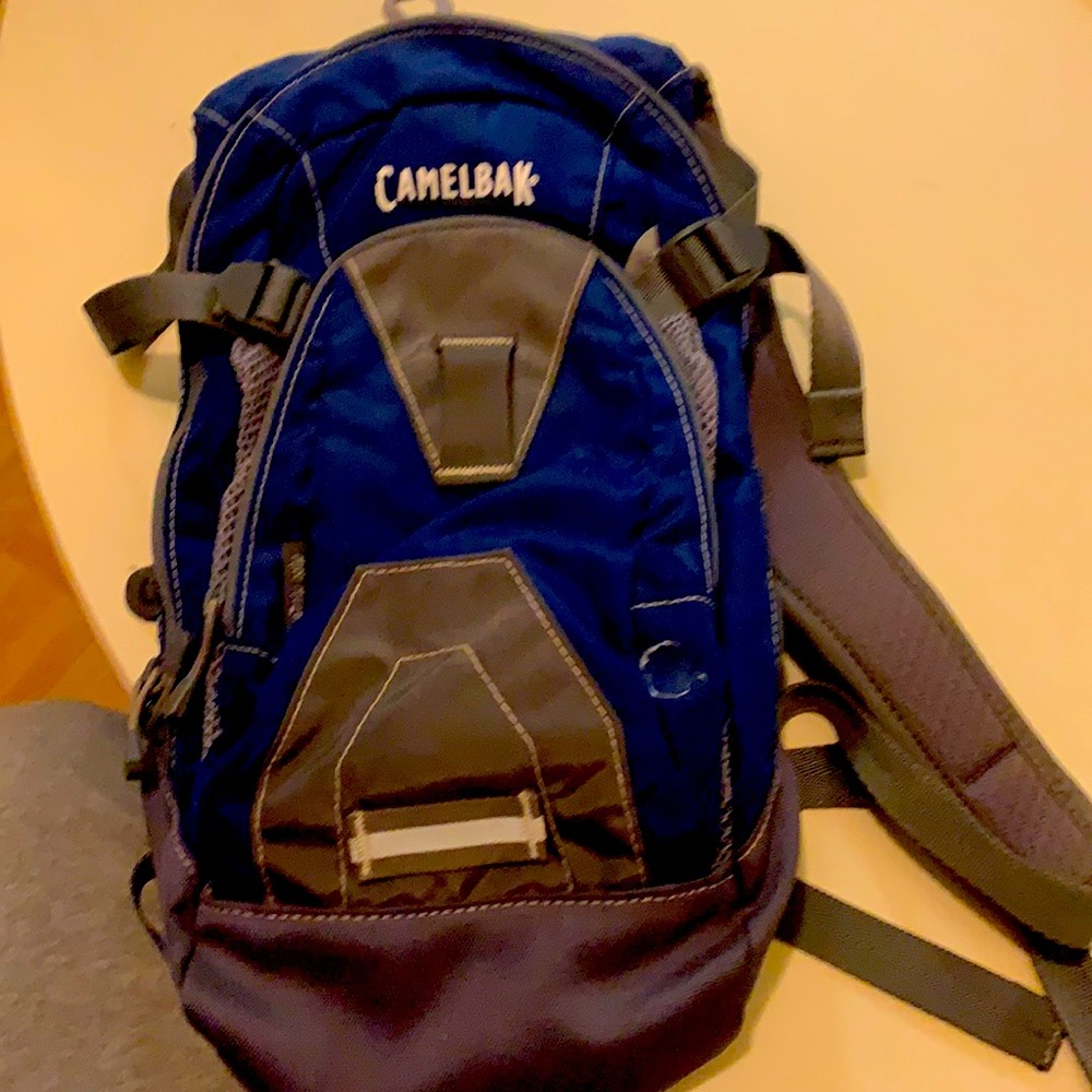 Used the color is blue is a camelbak mini mule three compartments as shown
